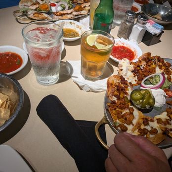 Menas Tex-Mex Grill Cantina - Al Pastor Nachos and Chicken Nachos and Carne Asada plate with salsa - Tex-Mex Near Me - Carrollton, Texas Menas Tex-Mex Grill Cantina - Al Pastor Nachos and Chicken Nachos and Carne Asada plate with salsa - Tex-Mex Near Me - Carrollton, Texas