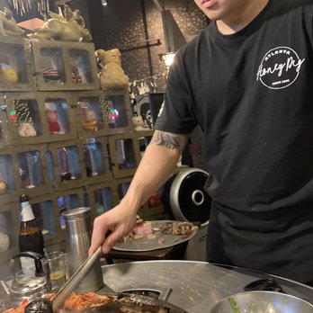 Honey Pig - Patrick made sure the fire cooked just right and sauces stayed full. - Korean Near Me - Duluth, Georgia