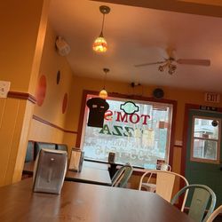 Tom's Pizza - Front window