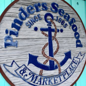 Pinders Seafood & Marketplace - a wooden sign - Seafood Markets Near Me - Jupiter, Florida