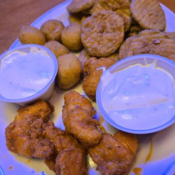 Texas Roadhouse - Appetizer sampler with rattlesnake bites, boneless buffalo chicken wings, and fried pickles. - Steakhouses Near Me - Sanford, Florida