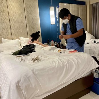 Hard Rock Hotel - Picture of my partner getting an IV due to Hard Rock causing her good poisoning, Dr's note to back it up - Hotels Near Me - Cancún, ROO
