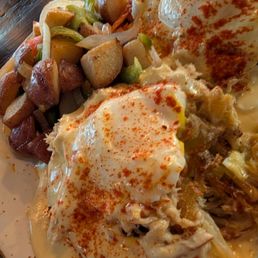 Crispy hashbrown with Crab and Sunny Side Eggs and Hollandaise