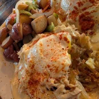 Bird and Bottle - Crispy hashbrown with Crab and Sunny Side Eggs and Hollandaise - New American Near Me - Tulsa, Oklahoma