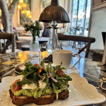 Glimmer Cafe - Burrata avocado toast and cappuccino - Cafes Near Me - Delray Beach, Florida