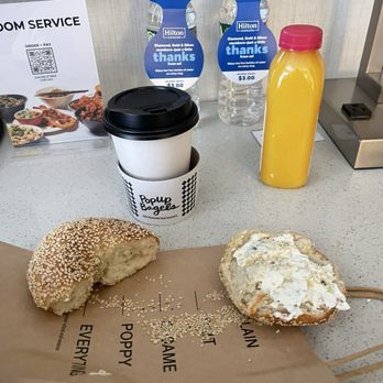 PopUp Bagels - Sesame bagel with scallion cream cheese, coffee and OJ. - Bagels Near Me - New York, New York