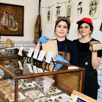 Parliament Chocolate - two women standing in front of a display case - Chocolatiers & Shops Near Me - Redlands, California Parliament Chocolate - two women standing in front of a display case - Chocolatiers & Shops Near Me - Redlands, California