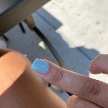 Happy Nails and Spa - blood is visible closer to the top, darker color under the polish. - Nail Salons Near Me - Middleton, Wisconsin