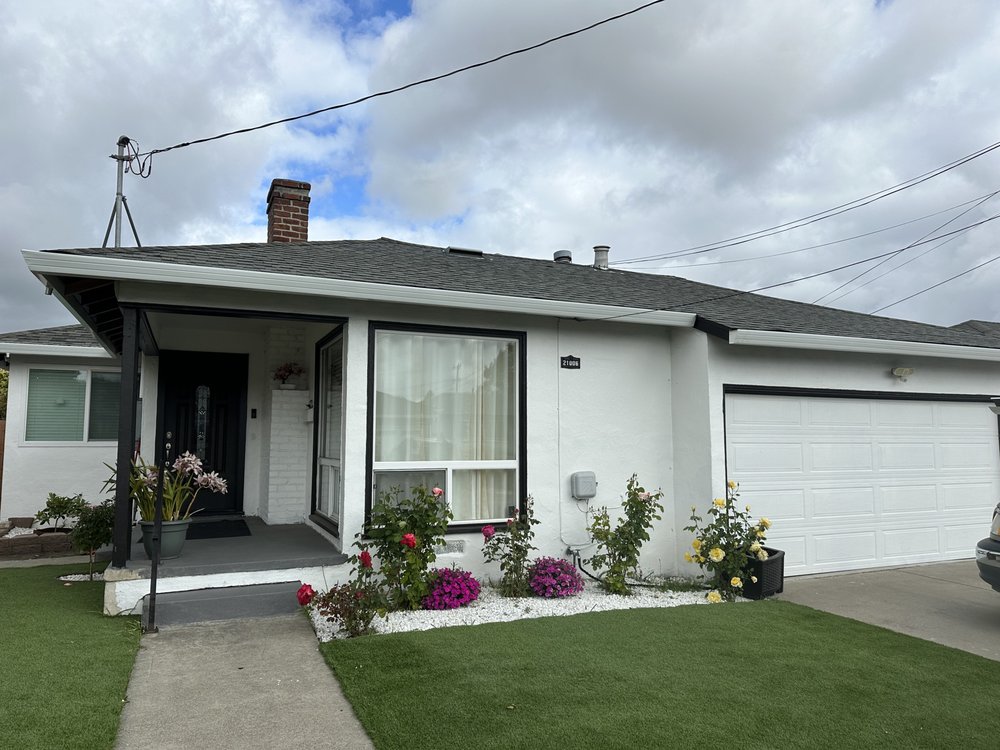 Slide of LAAC Roofing Services