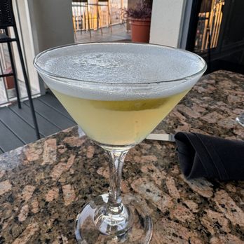 Marina Cafe - SIGNATURE MARTINI Titos Vodka, Elderflower Liqueur, Mango Puree, Grapefruit Juice, Sour - Seafood Near Me - Destin, Florida