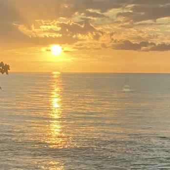 Cayo Azul - Sunset from the glass wall of the main dining room. - Seafood Near Me - Cabo Rojo, Puerto Rico Cayo Azul - Sunset from the glass wall of the main dining room. - Seafood Near Me - Cabo Rojo, Puerto Rico
