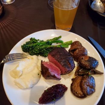 Rococo Steak - 7oz filet with broccolini, mash potatoes, and mushrooms. Yum! Everything was cooked perfectly. - Steakhouses Near Me - St. Petersburg, Florida