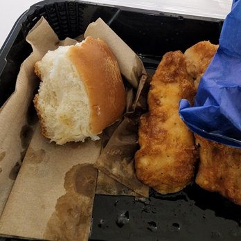 Culver's - Napking placed in the container to absorb the oil/grease. I broke of a piece of the oil soaked roll. Did not eat the fish. - Burgers Near Me - Maricopa, Arizona