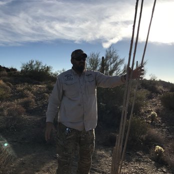 Desert Wolf Tours - Chris with the innards of a cactus - Tours Near Me - Phoenix, Arizona