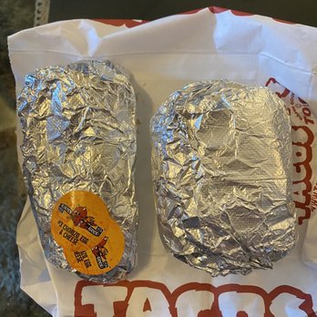 Torchy's Tacos - "Grande" beef burrito next to the breakfast taco. - Tex-Mex Near Me - Memphis, Tennessee