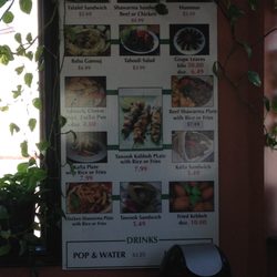 Menu posted on wall of restaurant