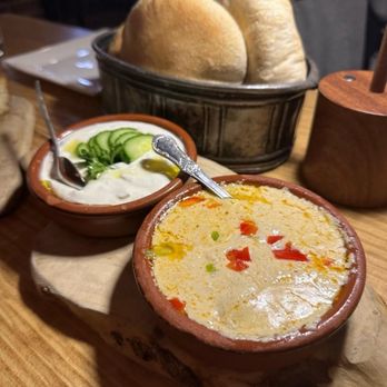 Çka Ka Qëllue - Sausage Dip (Orange), Tarator Dip (White), Bread - Modern European Near Me - New York, New York Çka Ka Qëllue - Sausage Dip (Orange), Tarator Dip (White), Bread - Modern European Near Me - New York, New York