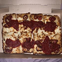 Pizza Hut - Delicious Detroit pizza. Just like the commercial. Pepperoni for the pups