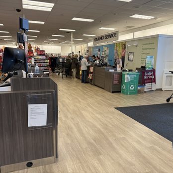 Kohl's - Inside Kohl's in Glenview, IL, the checkout and customer service counters are visible with shoppers and staff present. - Department Stores Near Me - GLENVIEW, Illinois