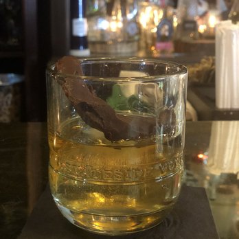 Braddock's - Bacon Washed Bourbon garnished with chocolate covered bacon. - New American Near Me - Medford, New Jersey