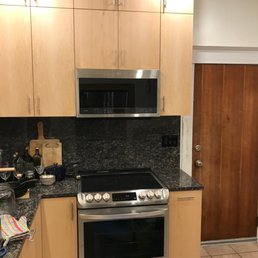 a kitchen with stainless steel appliances a kitchen with stainless steel appliances