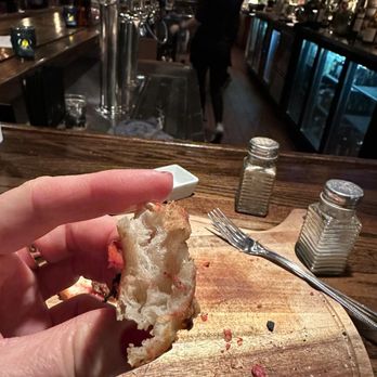 Chatter Nook Bistro - Fluffy crispy crust of the edge of the pizza - Tapas/Small Plates Near Me - Red Wing, Minnesota