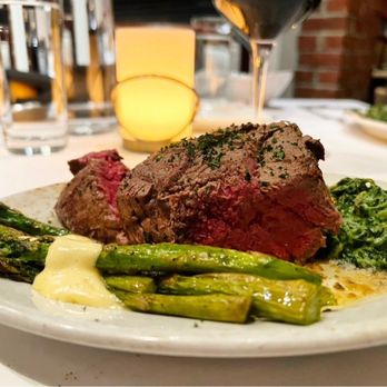 Ruth's Chris Steakhouse - Filet Mignon, Served with sizzling butter on a hot plate. Grilled asparagus with Hollandaise,their famous creamed spinach. - Steakhouses Near Me - Asheville, North Carolina Ruth's Chris Steakhouse - Filet Mignon, Served with sizzling butter on a hot plate. Grilled asparagus with Hollandaise,their famous creamed spinach. - Steakhouses Near Me - Asheville, North Carolina
