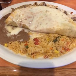 Steak and cheese burrito, with chicken and steak.