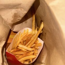 McDonald's - Gave me old, burnt hard fries. Not friendly either.