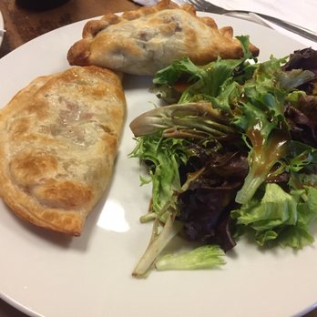Cecilia's Kitchen - On the left- Berenjena; at the top- Carne de Vaca empanadas. - Latin American Near Me - Asheville, North Carolina Cecilia's Kitchen - On the left- Berenjena; at the top- Carne de Vaca empanadas. - Latin American Near Me - Asheville, North Carolina