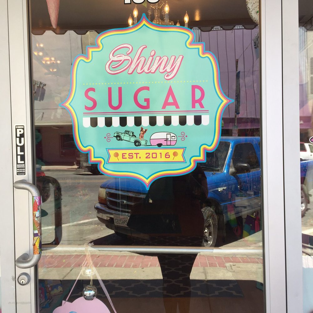 Shiny Sugar - a sign in the window of a store - Candy Stores Near Me - Hanford, California Shiny Sugar - a sign in the window of a store - Candy Stores Near Me - Hanford, California