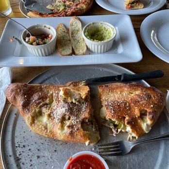 Mellow Mushroom Lexington - Sausage calzone with added jalapeños, quac appetizer, and build your own pizza. So good!! - Pizza Near Me - Lexington, South Carolina Mellow Mushroom Lexington - Sausage calzone with added jalapeños, quac appetizer, and build your own pizza. So good!! - Pizza Near Me - Lexington, South Carolina