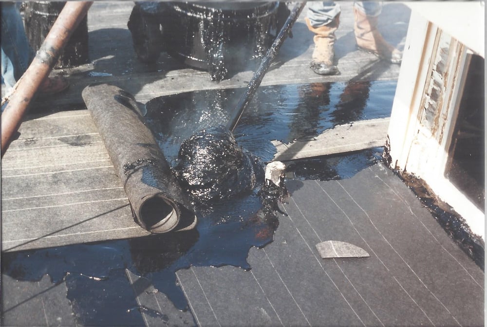 Slide of Tooter's Roofing