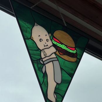 Glendale Burger Shop - Stained glass art in the window by our table, Burger Baby!! - Burgers Near Me - Traverse City, Michigan