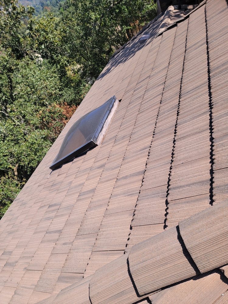 Slide of Hernandez's Roofing