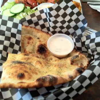 Jambo Grill - naan bread with garlic salt - African Near Me - Vancouver, British Columbia Jambo Grill - naan bread with garlic salt - African Near Me - Vancouver, British Columbia
