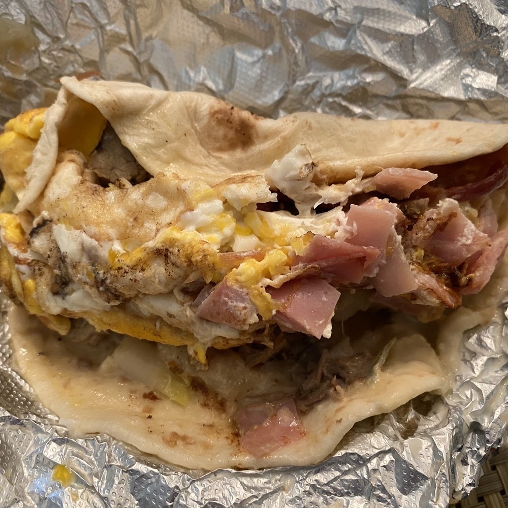 Shamrock Tacos - OLDIE: Fajita, potato, ham, fried egg, bacon, pepper jack queso. This will fill you up for a long time. Maybe until you're older. - Tacos Near Me - Wimberley, Texas