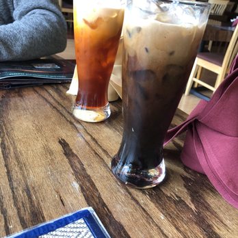 Sweet Basil Thai Bistro - Thai tea (left) Thai coffee (right) - Thai Near Me - Denton, Texas Sweet Basil Thai Bistro - Thai tea (left) Thai coffee (right) - Thai Near Me - Denton, Texas