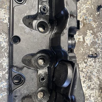 RG Motorworks - The old valve cover they should have replaced when they did the job. Instead they shoved the bolts back in stripped holes. - Auto Repair Near Me - Henderson, Nevada