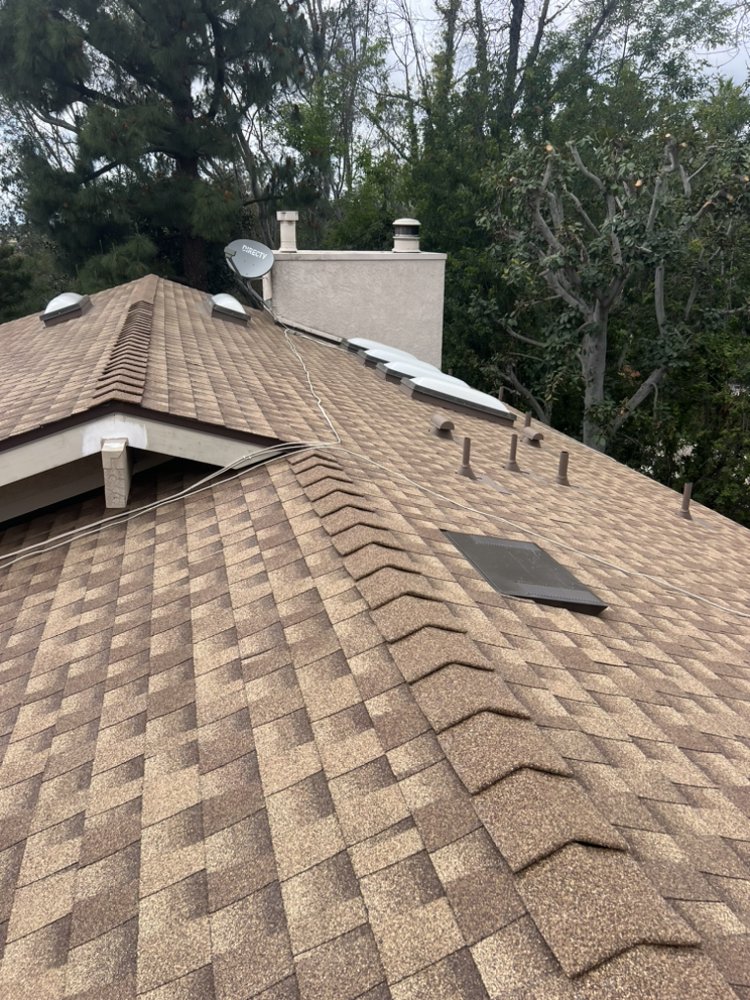 Slide of JVR Quality Roofing