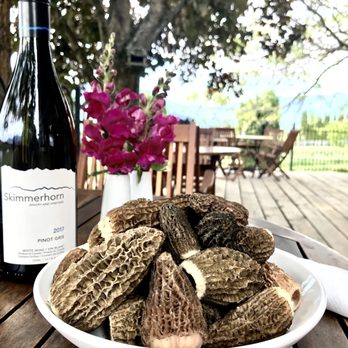 Skimmerhorn Winery & Vineyard - a plate of mushrooms and a bottle of wine - Wineries Near Me - Creston, British Columbia Skimmerhorn Winery & Vineyard - a plate of mushrooms and a bottle of wine - Wineries Near Me - Creston, British Columbia