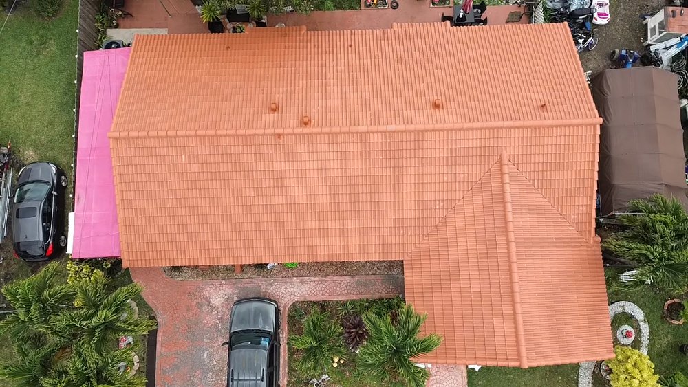 Slide of MC Roofing Service