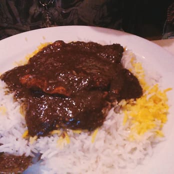 Galleria Restaurant - Chicken, walnut and pomegranate stew served with rice. - Persian/Iranian Near Me - London, XGL Galleria Restaurant - Chicken, walnut and pomegranate stew served with rice. - Persian/Iranian Near Me - London, XGL