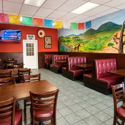 Booth seating with wall mural