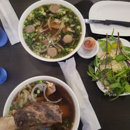 P3 and P5 pho bowls. Huge portion, -- tasty broth and plenty of meat and rice noodles.