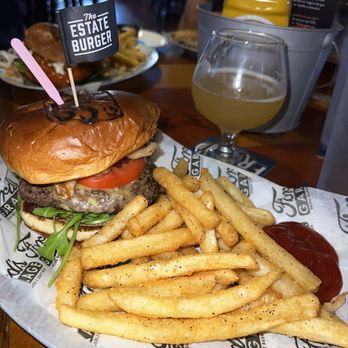 Ford's Garage Plantation - Estate burger & New Belgium Voodoo Ranger Juicy Haze IPA - Bars Near Me - Plantation, Florida