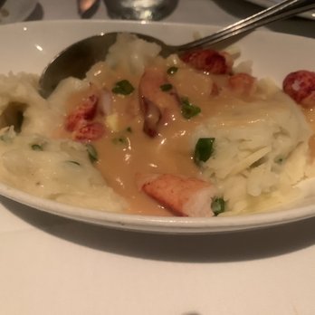 Eddie V's Prime Seafood - Butter Poached Lobster, White Cheddar Mashed Potatoes - Steakhouses Near Me - Houston, Texas Eddie V's Prime Seafood - Butter Poached Lobster, White Cheddar Mashed Potatoes - Steakhouses Near Me - Houston, Texas