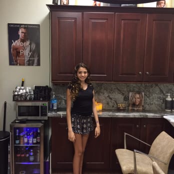 Reed's Kitchens & Baths - A beautiful model in front of beautiful cabinets! - Kitchen & Bath Near Me - San Leandro, California Reed's Kitchens & Baths - A beautiful model in front of beautiful cabinets! - Kitchen & Bath Near Me - San Leandro, California
