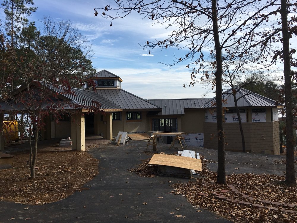 Slide of Patch Adams Roofing