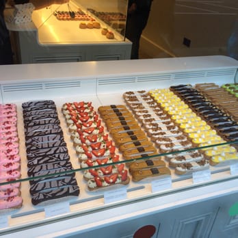 Maitre Choux - Eclair of many different flavors in the window. - Desserts Near Me - London, XGL Maitre Choux - Eclair of many different flavors in the window. - Desserts Near Me - London, XGL